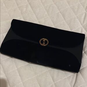 Gucci Black Clutch with Gold Logo